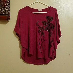 Fushia batwing with black bows w/strings